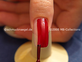 Nail lacquer in the colour red