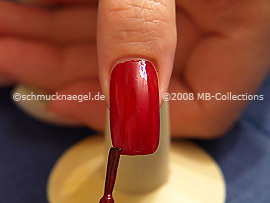 Nail lacquer in the colour red