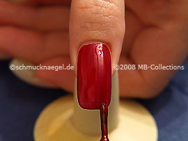 Nail lacquer in the colour red