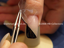 Tweezers and clear adhesive tape