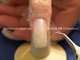 Clear adhesive tape and tweezers