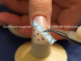 Nail sticker and the tweezers