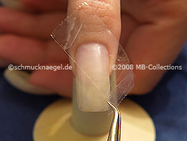 Clear adhesive tape and tweezers