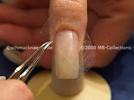 Clear adhesive tape and tweezers