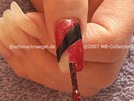 Nail polish in the colour red-glitter