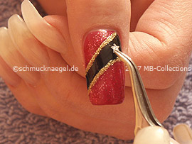 Tweezers and strass stones