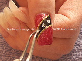Tweezers and strass stones