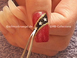Tweezers and strass stones