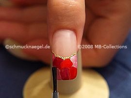 The clear nail polish protects the nail art