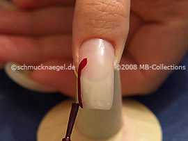 Nail lacquer in the colour claret-red