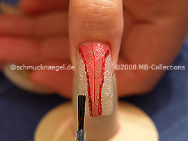 The clear nail lacquer protects the nail art