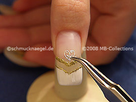 Nail tattoo sheet and the tweezers