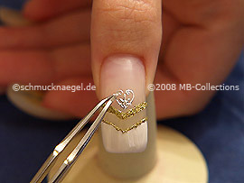 Nail tattoo sheet and the tweezers