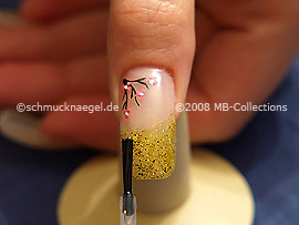 The clear nail lacquer protects the nail art