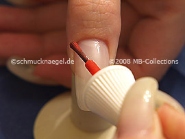 Neon nail polish in the colour orange
