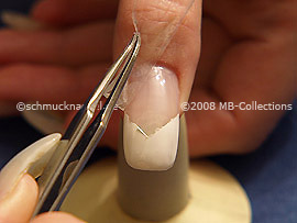 Tweezers and clear adhesive tape