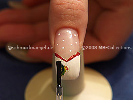 The clear nail lacquer protects the nail art