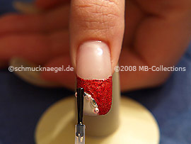 The clear nail lacquer protects the nail art