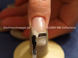 The clear nail lacquer protects the nail art