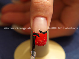 The clear nail lacquer protects the nail art