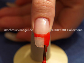 Nail lacquer in the colour dark orange