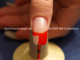 Nail lacquer in the colour dark orange