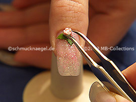 Tweezers and a ceramic floret