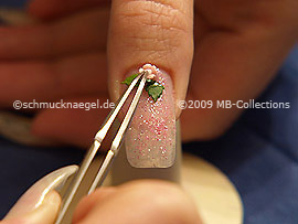 Tweezers and a ceramic floret
