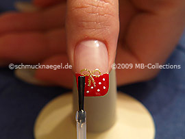 The clear nail lacquer protects the nail art