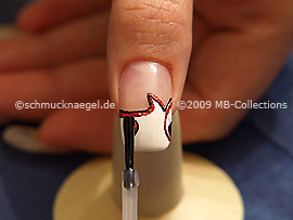 The clear nail lacquer protects the nail art