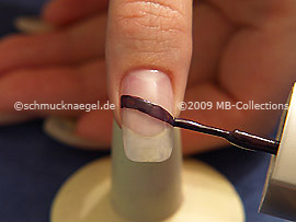 Nail lacquer in the colour dark purple