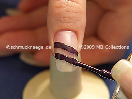 Nail lacquer in the colour dark purple