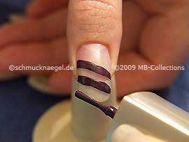 Nail lacquer in the colour dark purple