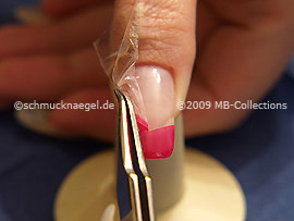 Tweezers and clear adhesive tape