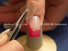 Tweezers and clear adhesive tape