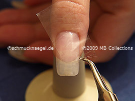 Clear adhesive tape and tweezers