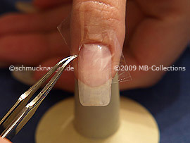 Clear adhesive tape and tweezers