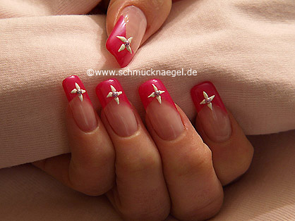 Nail art motif with half pearls and nail lacquer