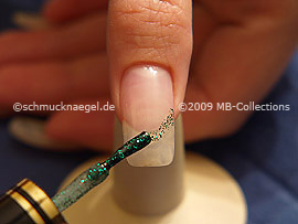 Nail lacquer in the colour green-Glitter