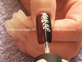 Clear nail polish, strass stones in crystal and spot-swirl