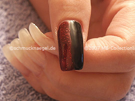 Nail polish in the colour dark-red-glitter