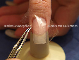 Clear adhesive tape and tweezers