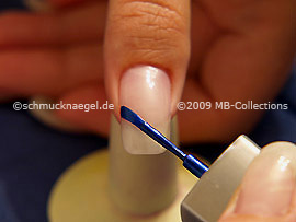 Nail lacquer in the colour dark blue