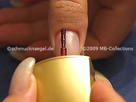 Nail lacquer in the colour red