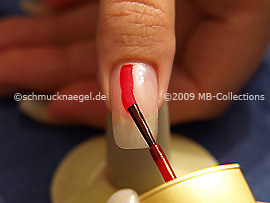 Nail lacquer in the colour red