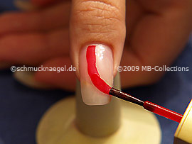 Nail lacquer in the colour red