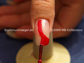 Nail lacquer in the colour red