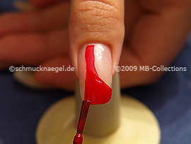 Nail lacquer in the colour red