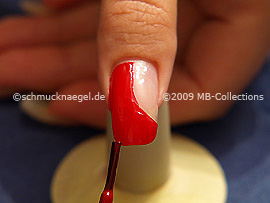 Nail lacquer in the colour red