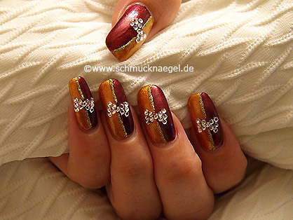 Nail art with strass stones and nail lacquers